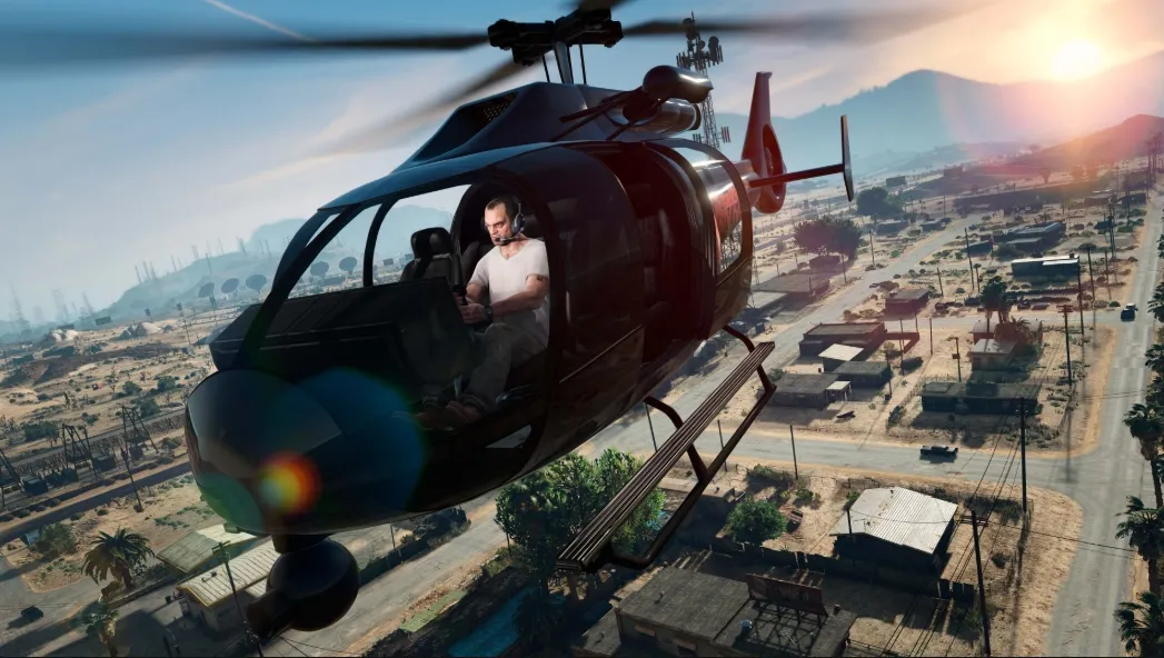 GTA 5 Trevor flying a helicopter over the desert landscape of Los Santos